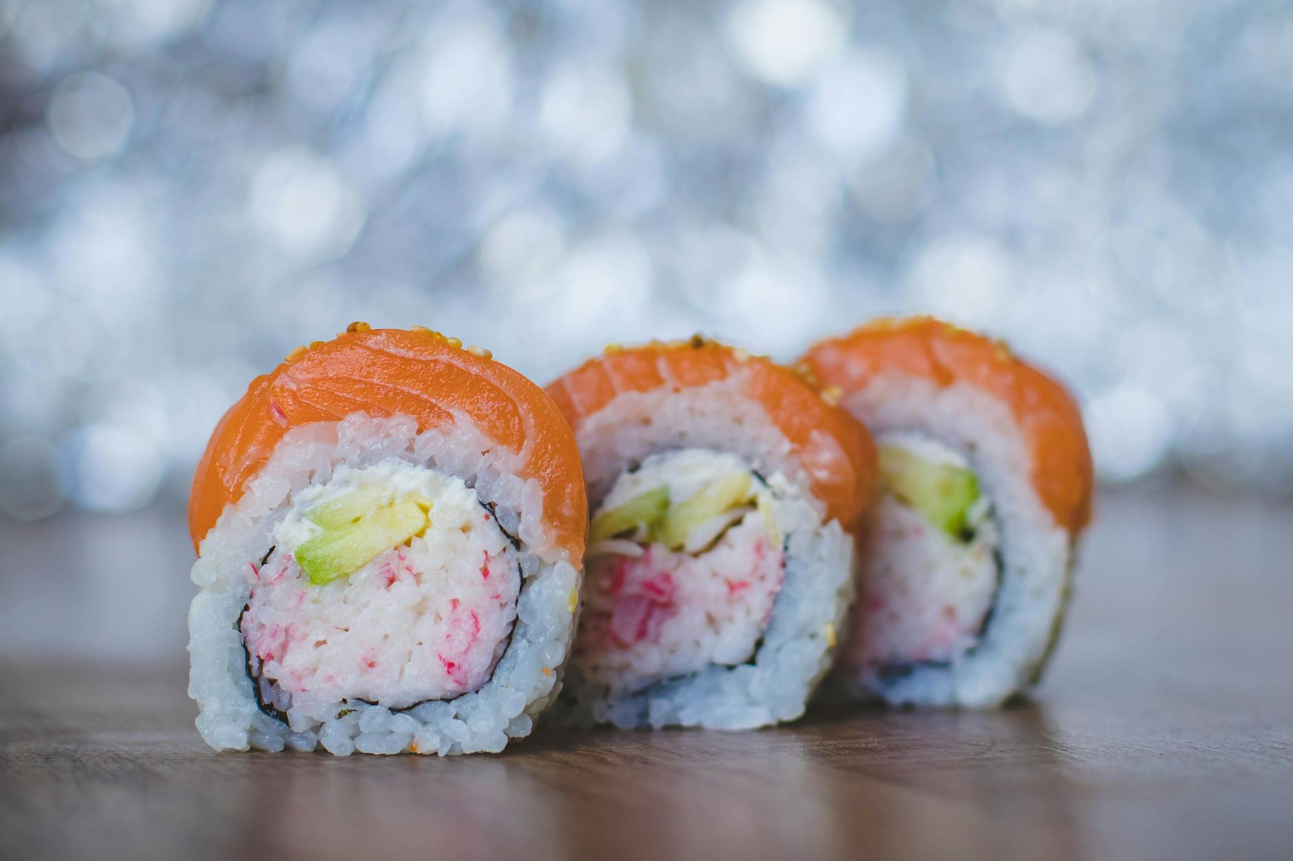 close up photo of three sushi