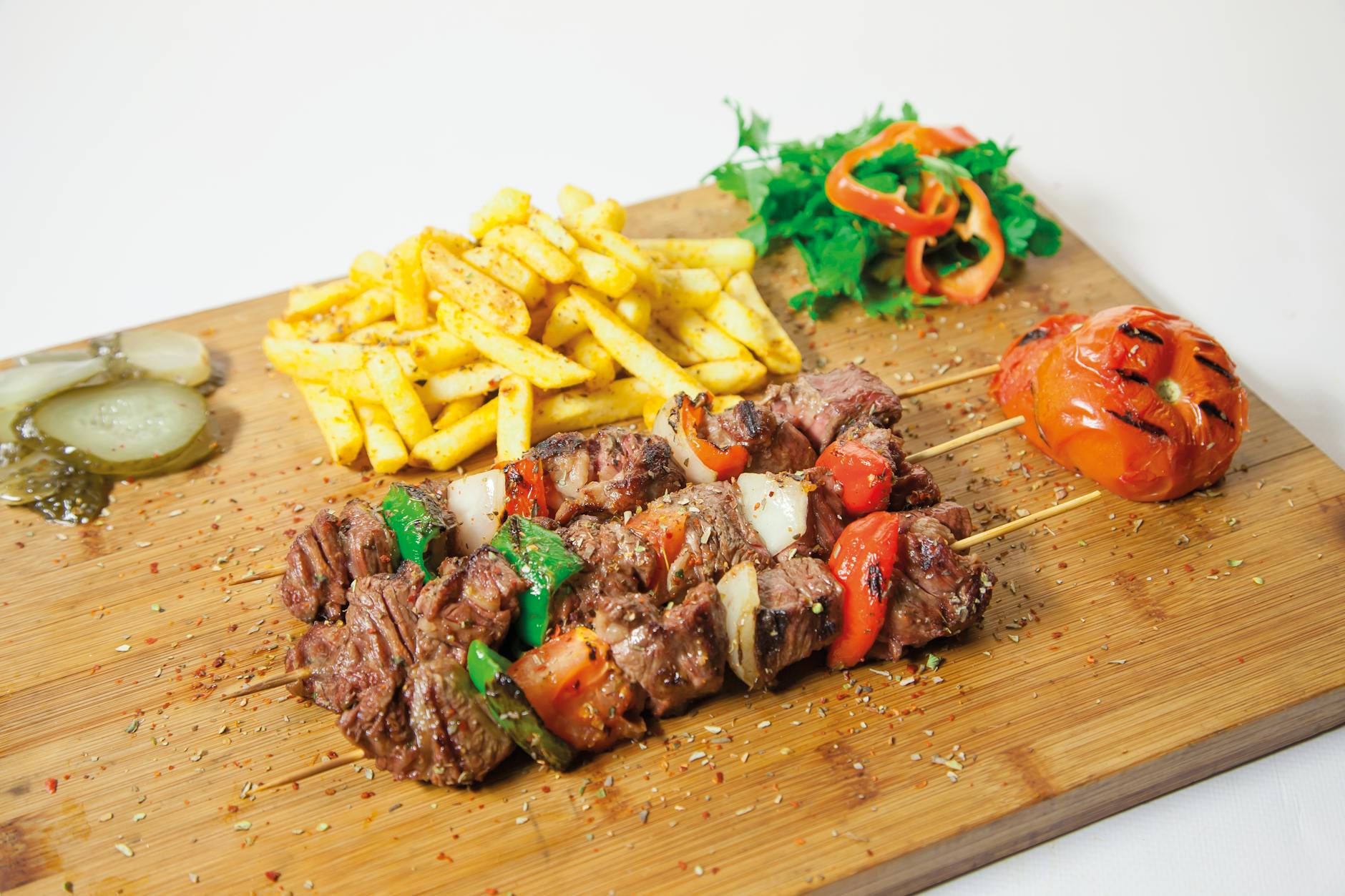 brown chopping board with barbeque