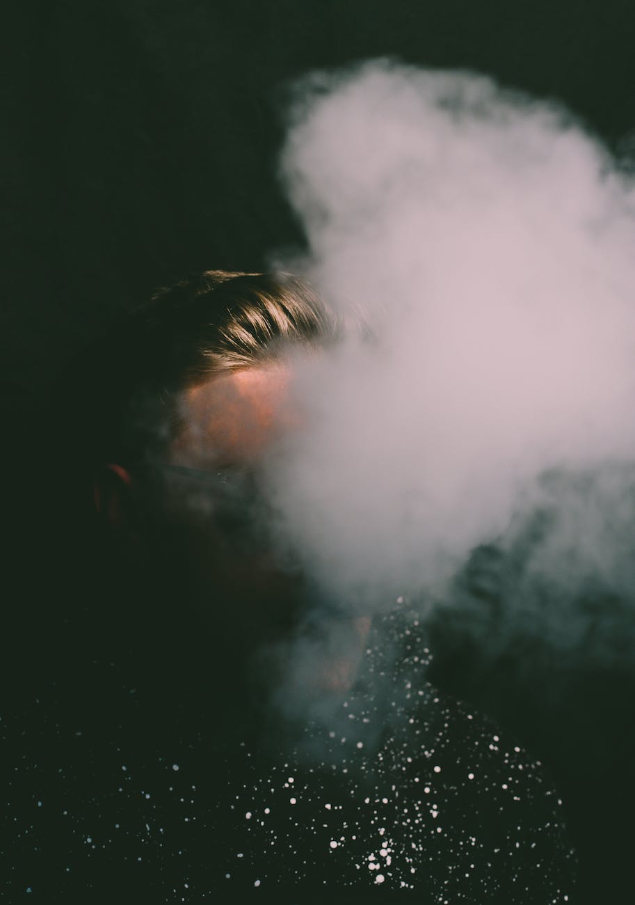 white smoke in dark background