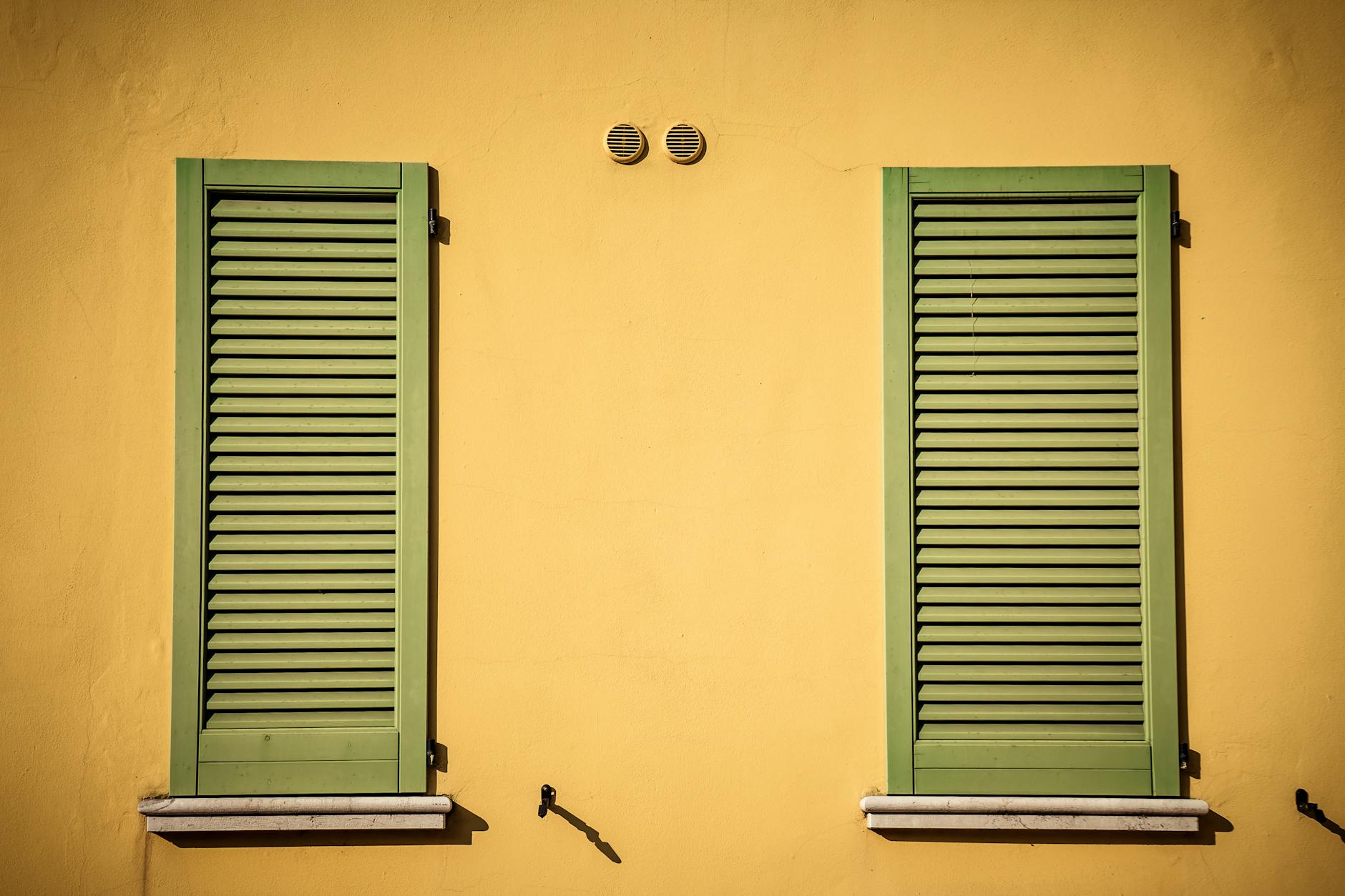 closed green wooden windows