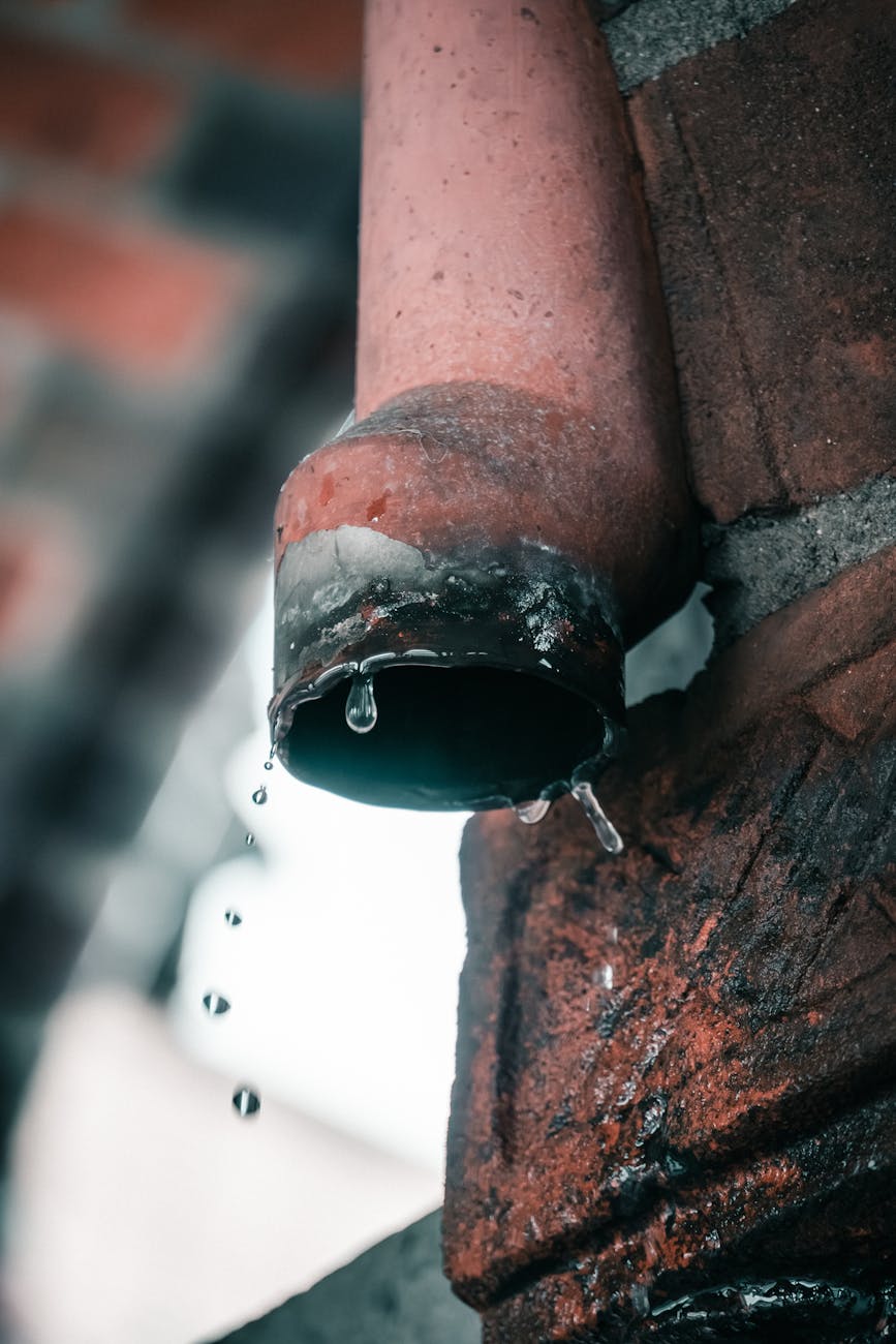 water droplets coming out of a pipe