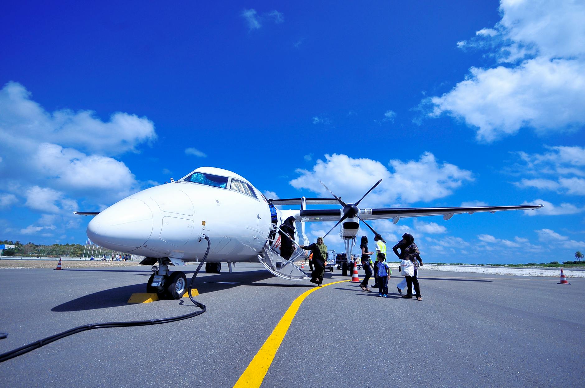 white jet on black tarmac