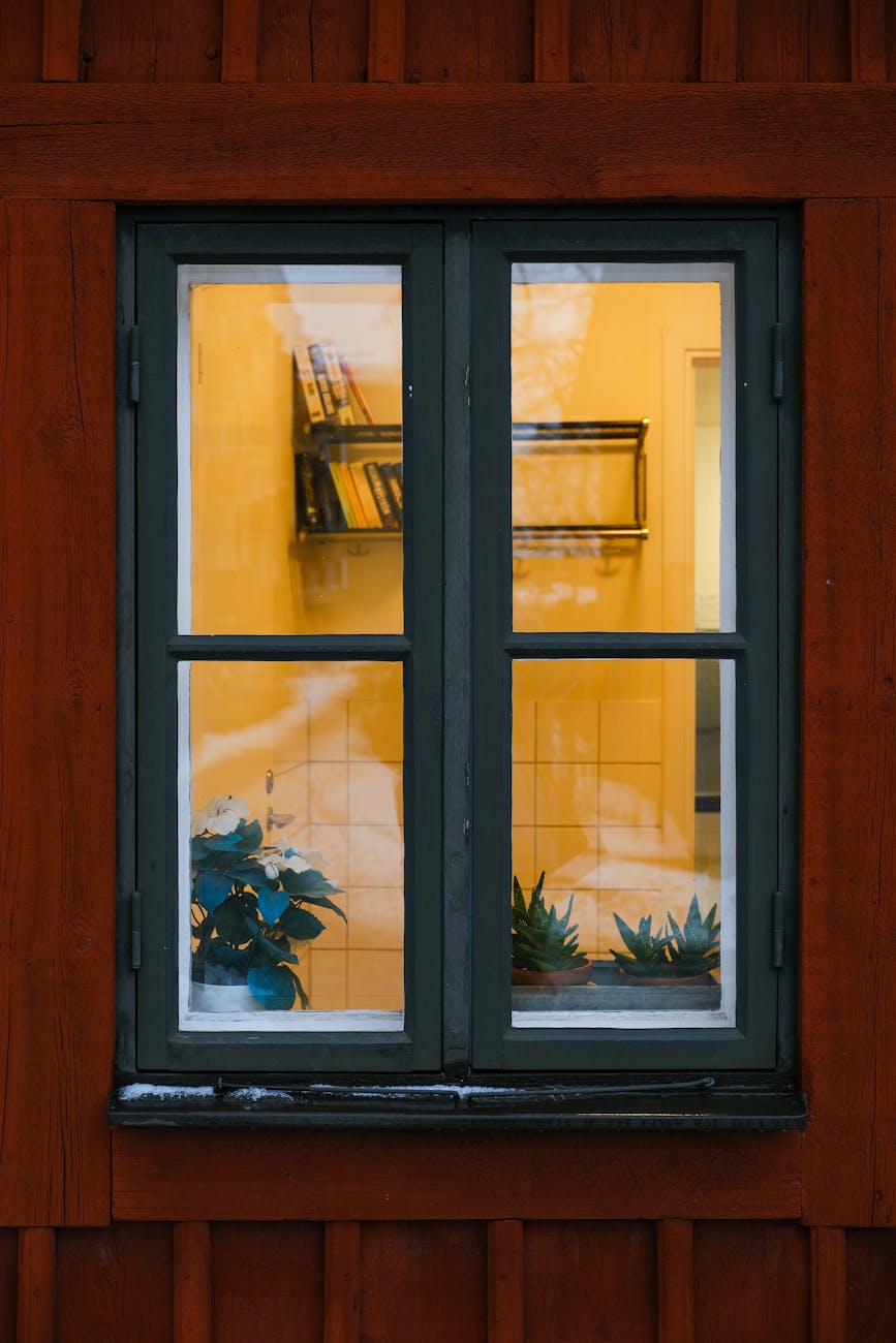 a window in a red house
