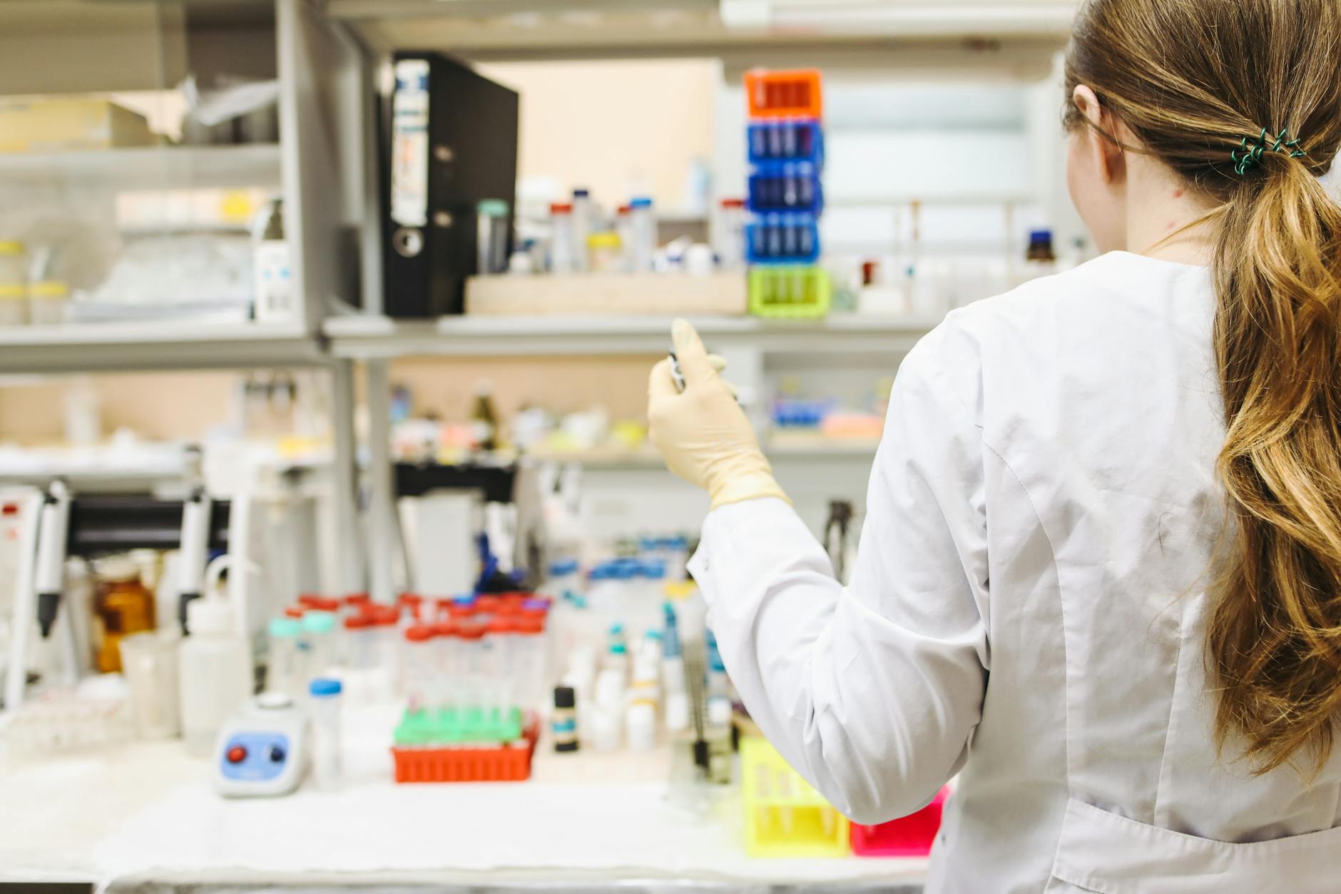 woman in white laboratory gown