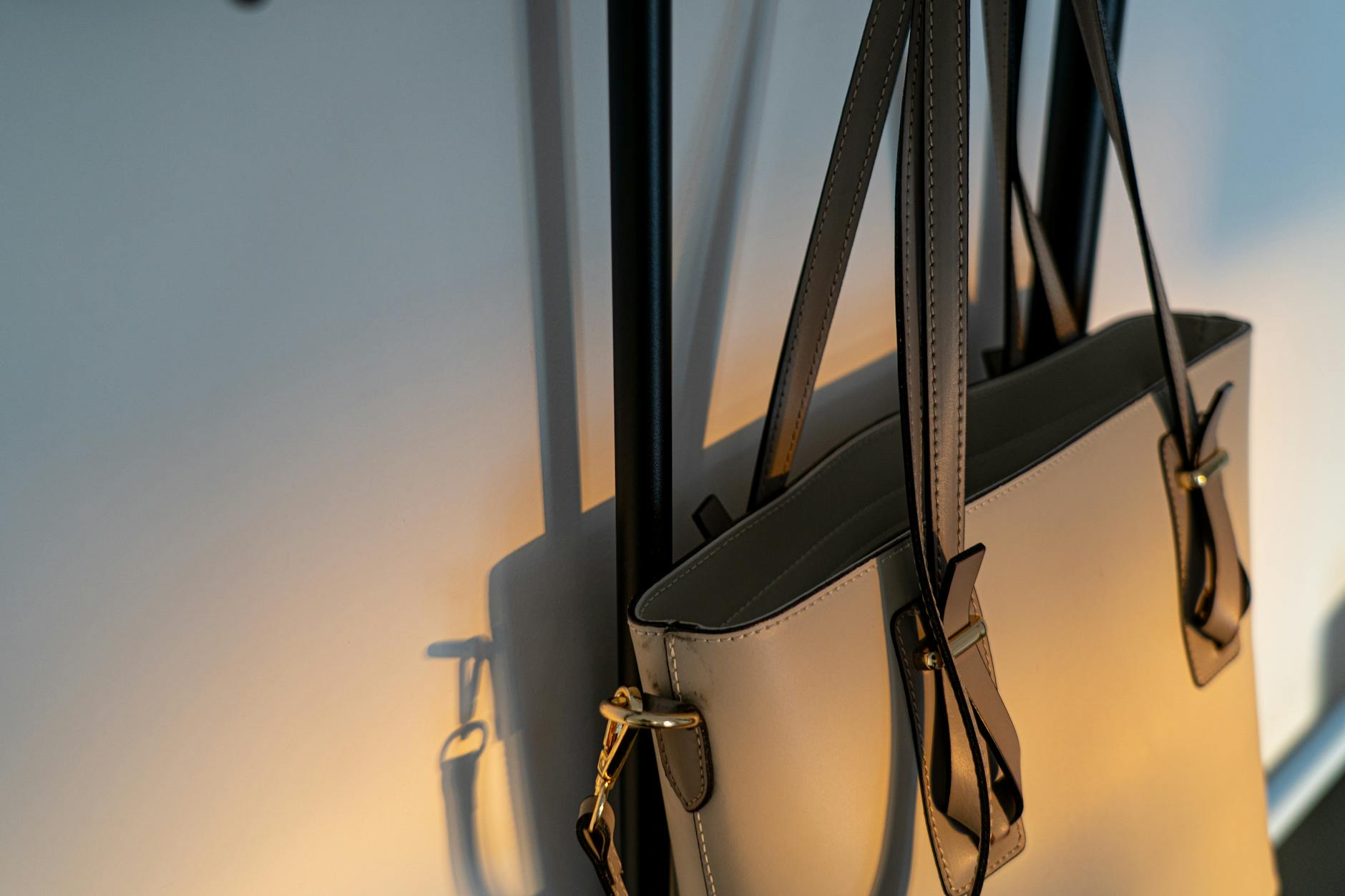close up photo of a handbag hanging on a wall