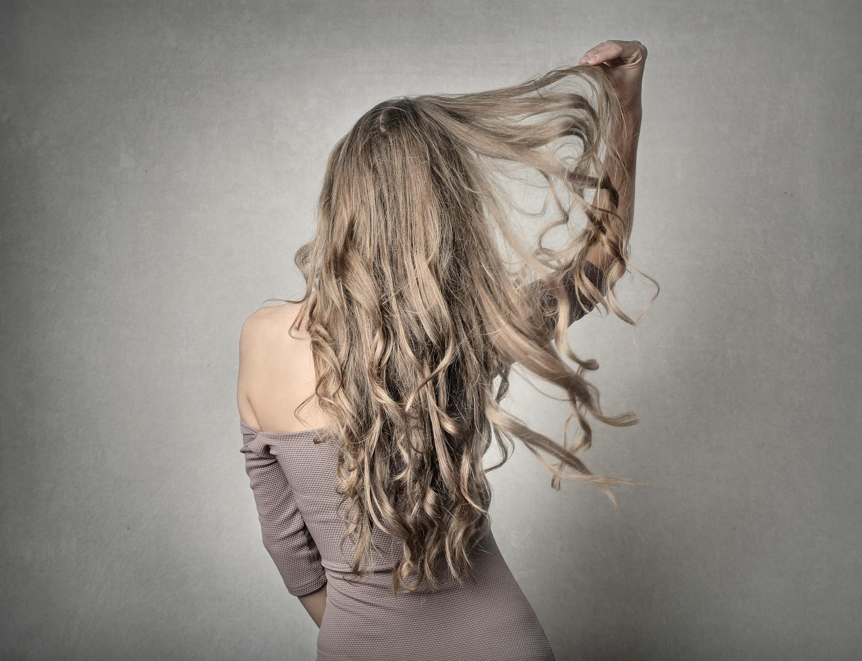 woman wearing gray dress