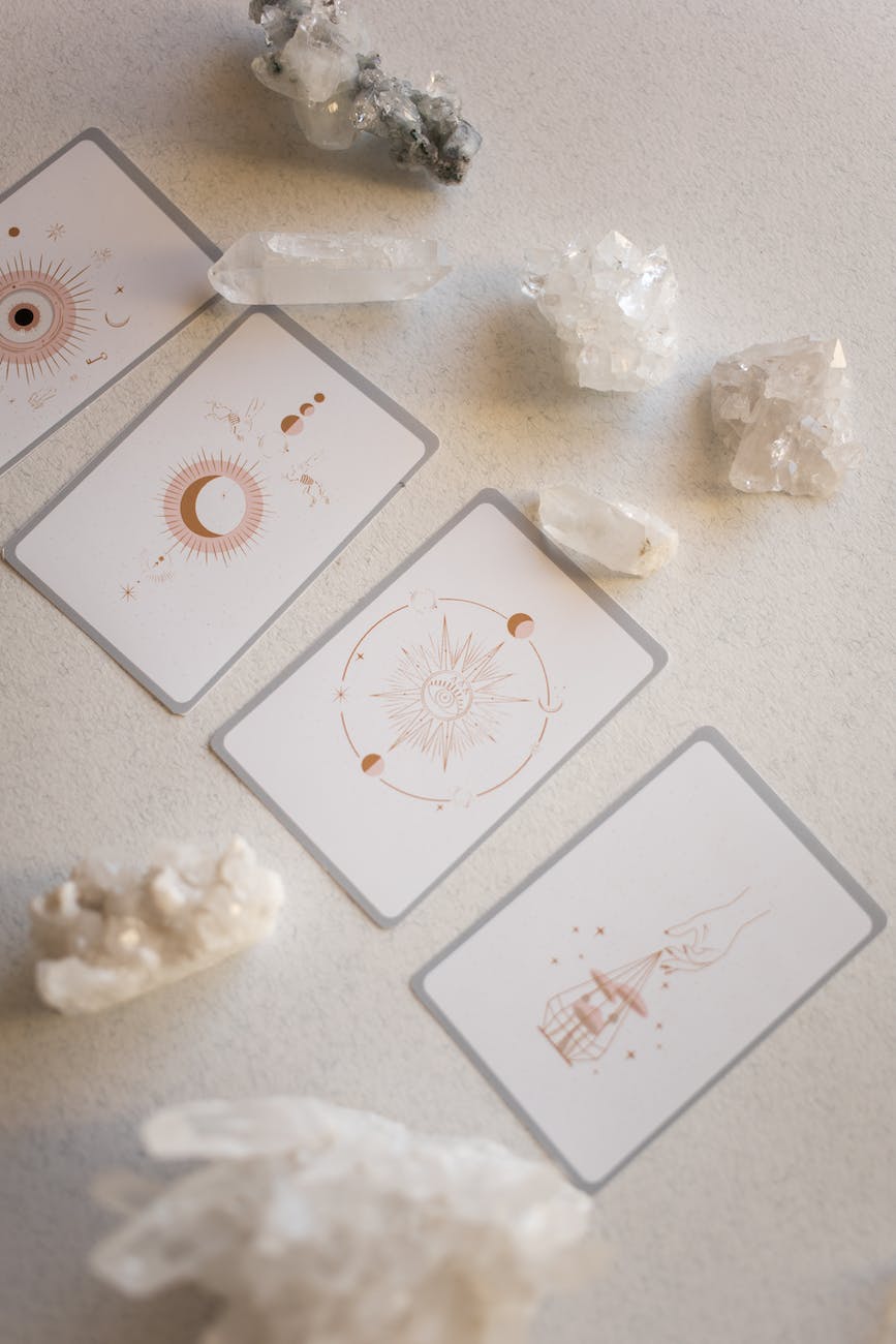 close up of tarot cards and crystals
