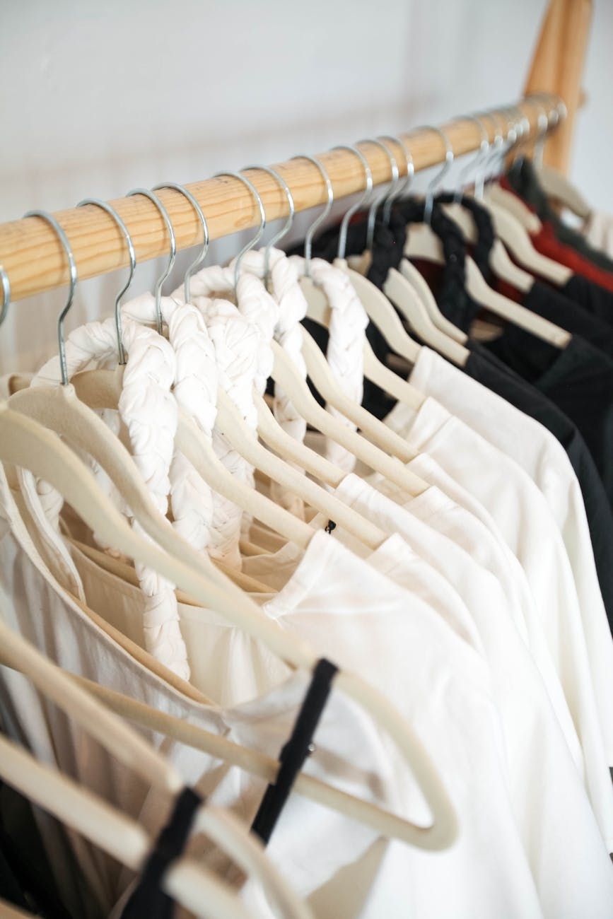 clse up of clothes hanging on a clothing rack