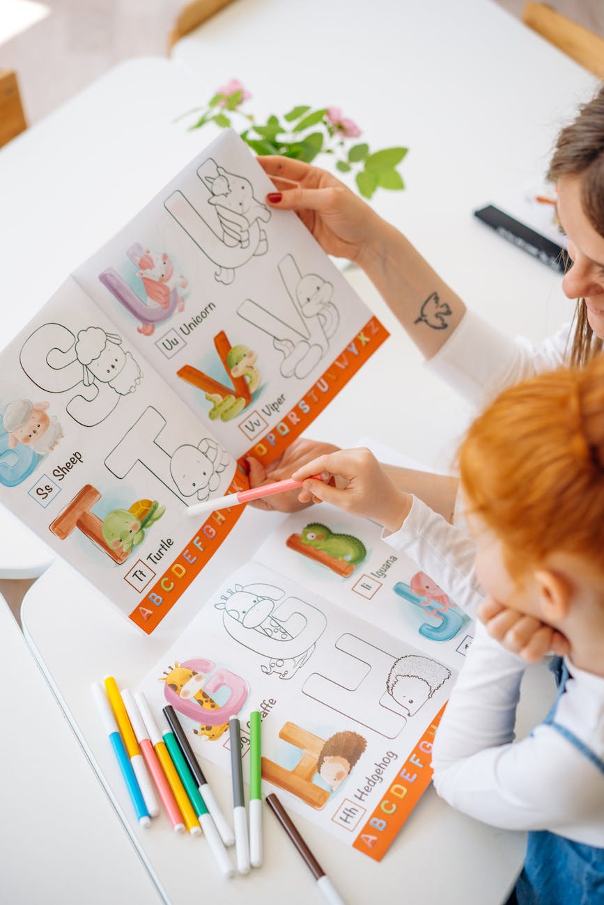 a girl learning alphabets