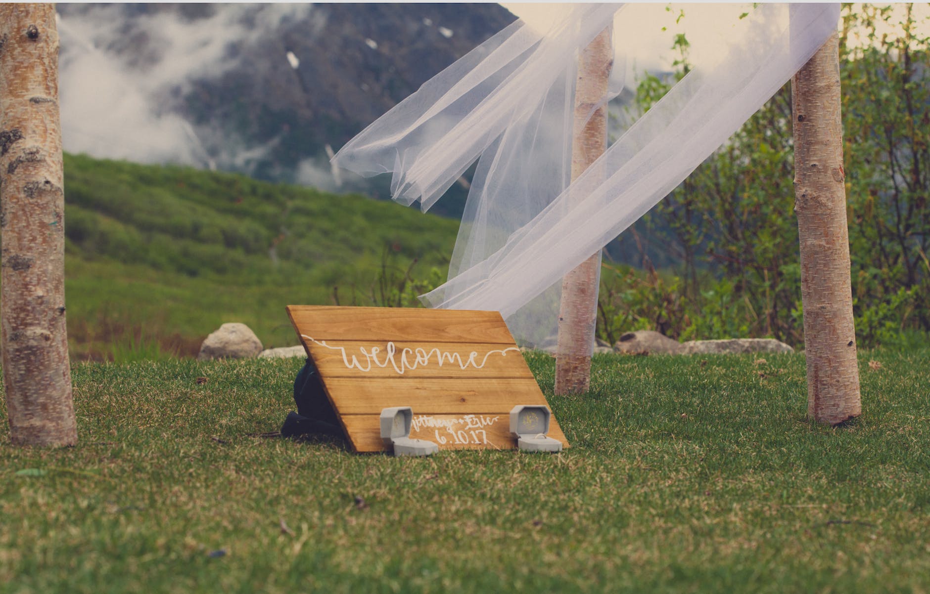 welcome printed board on grass